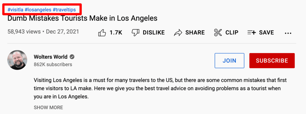 Optimize YouTube description: A screenshot of Wolters World channel page showing three hashtags: #visitla, #losangeles, and #traveltips