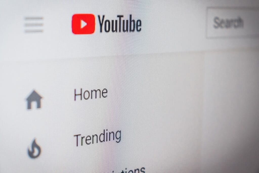 Image accompanying "How does YouTube recommend videos?" A screenshot of the YouTube menu with "trending" in selective focus